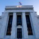 Federal Reserve raises key rate by quarter-point from near 0 in effort to tame inflation