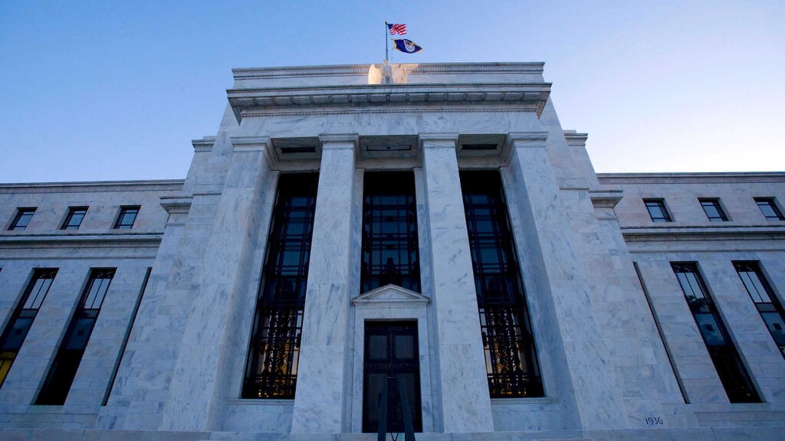 Federal Reserve raises key rate by quarter-point from near 0 in effort to tame inflation