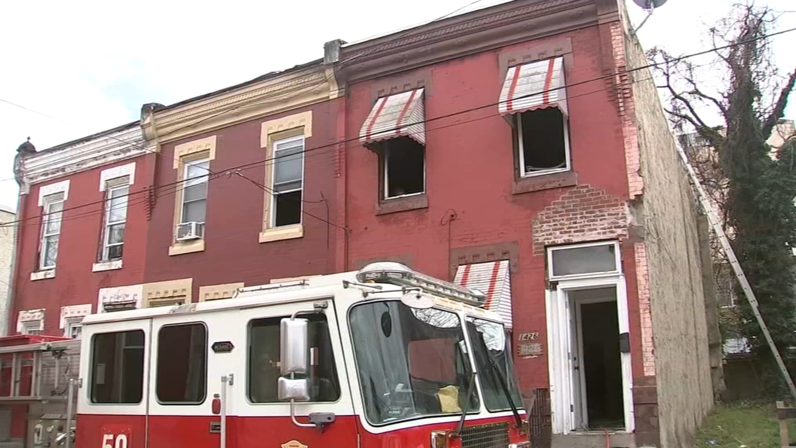 2 police officers help rescue man from burning Philadelphia home