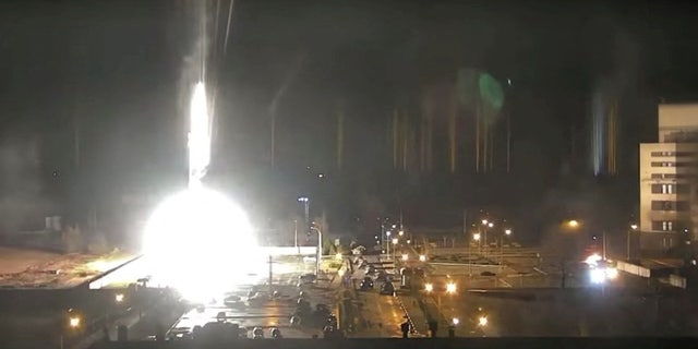 Surveillance footage shows a flare landing at the Zaporizhzhia nuclear power plant.