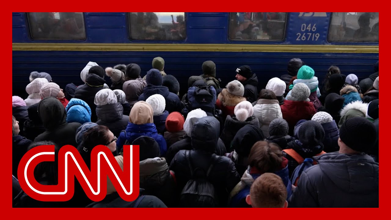 Families flee Zaporizhzhia, Ukraine, on packed trains after Russians seize nuclear power station