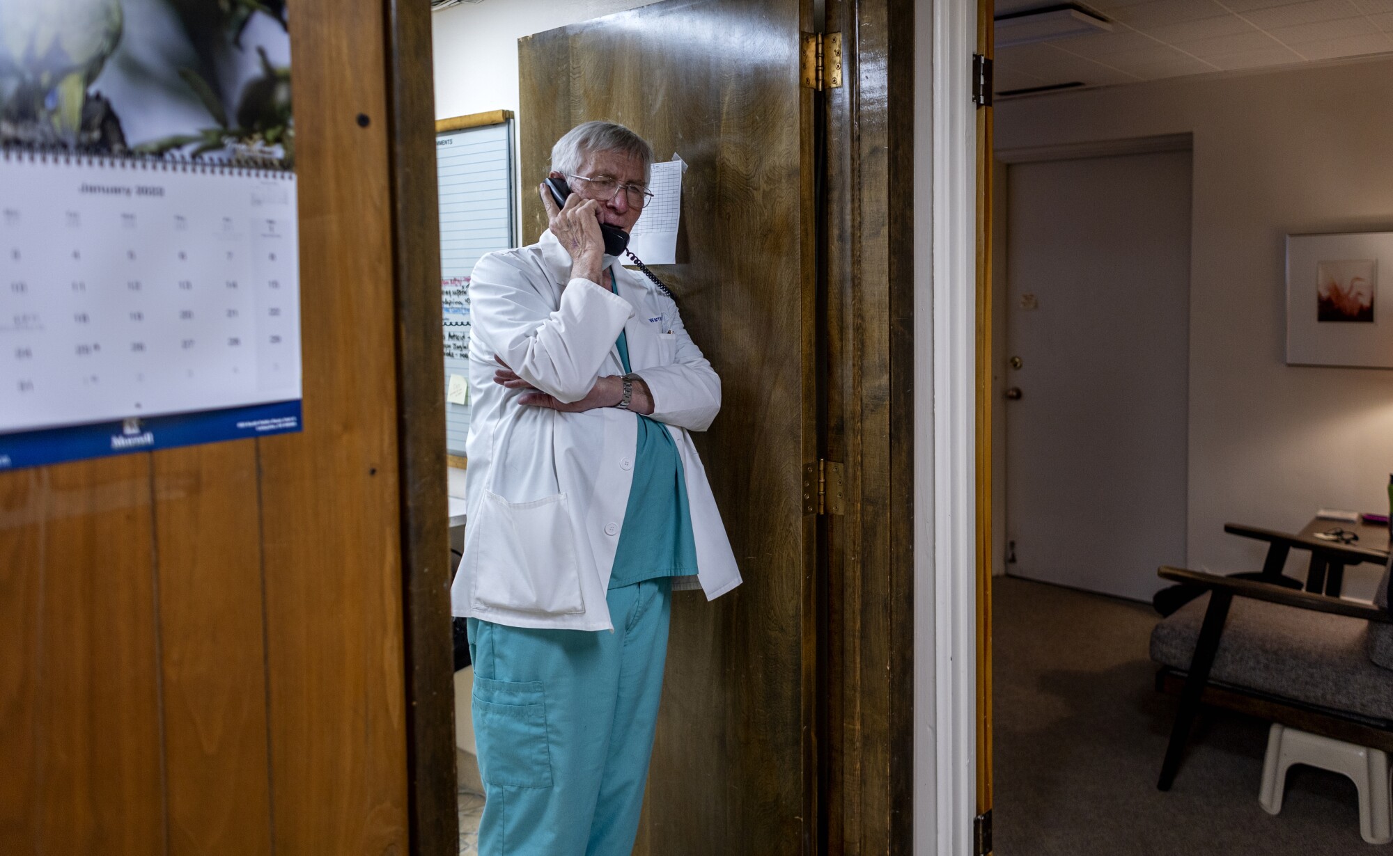 Dr. Warren Hern on the phone at his clinic  