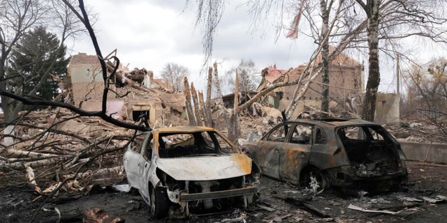 Gutted cars following a night air raid in the village of Bushiv, 40 kilometers west of Kyiv.