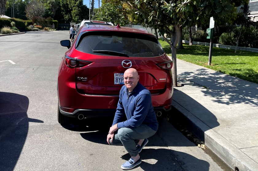 Charley McLean and his Mazda CX-5.