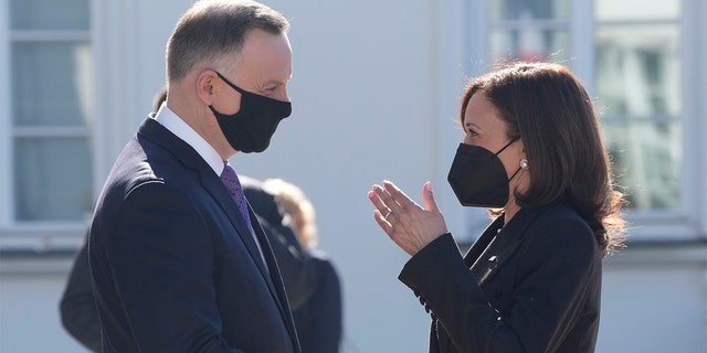 U.S. Vice President Kamala Harris is greeted by Polish President Andrzej Duda during their meeting in Warsaw, Thursday, March 10, 2022. (AP Photo/Czarek Sokolowski)