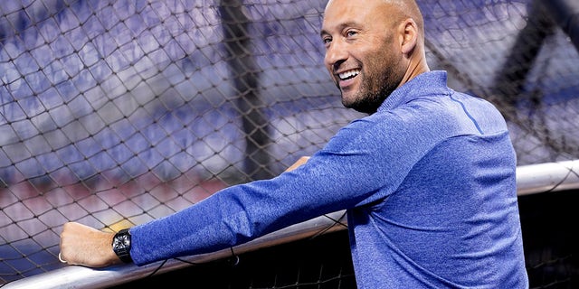 Derek Jeter, CEO of the Miami Marlins, watches batting practice before a baseball game against the Philadelphia Phillies, Saturday, Oct. 2, 2021, in Miami.