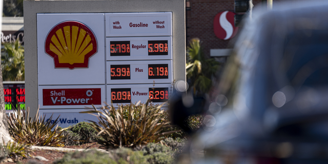 Signage with fuel prices at a Shell gas station in Hercules, California, U.S., on Wednesday, March 9, 2022. 