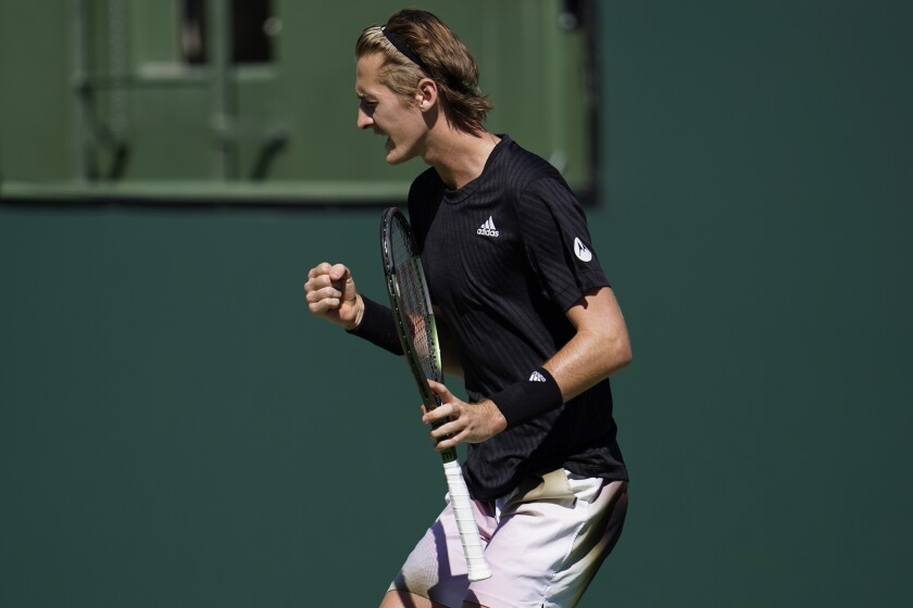 Sebastian Korda reacts after winning a point against Rafael Nadal.