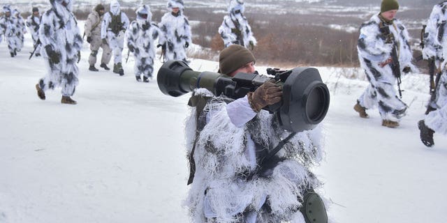 Ukrainian soldiers take part in an exercise for the use of NLAW anti-tank missiles at the Yavoriv military training ground close to Lviv, western Ukraine on Jan. 28, 2022. 