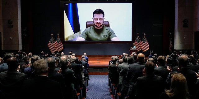 Ukrainian President Volodymyr Zelenskyy delivers a virtual address to Congress by video at the Capitol in Washington, Wednesday, March 16, 2022.