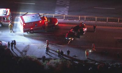 Hit-and-run crash on PCH in Pacific Palisades sends car into ocean; 2 arrested