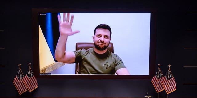 Ukrainian President Volodymyr Zelenskyy speaks to the U.S. Congress by video to plead for support as his country is besieged by Russian forces, at the Capitol in Washington.