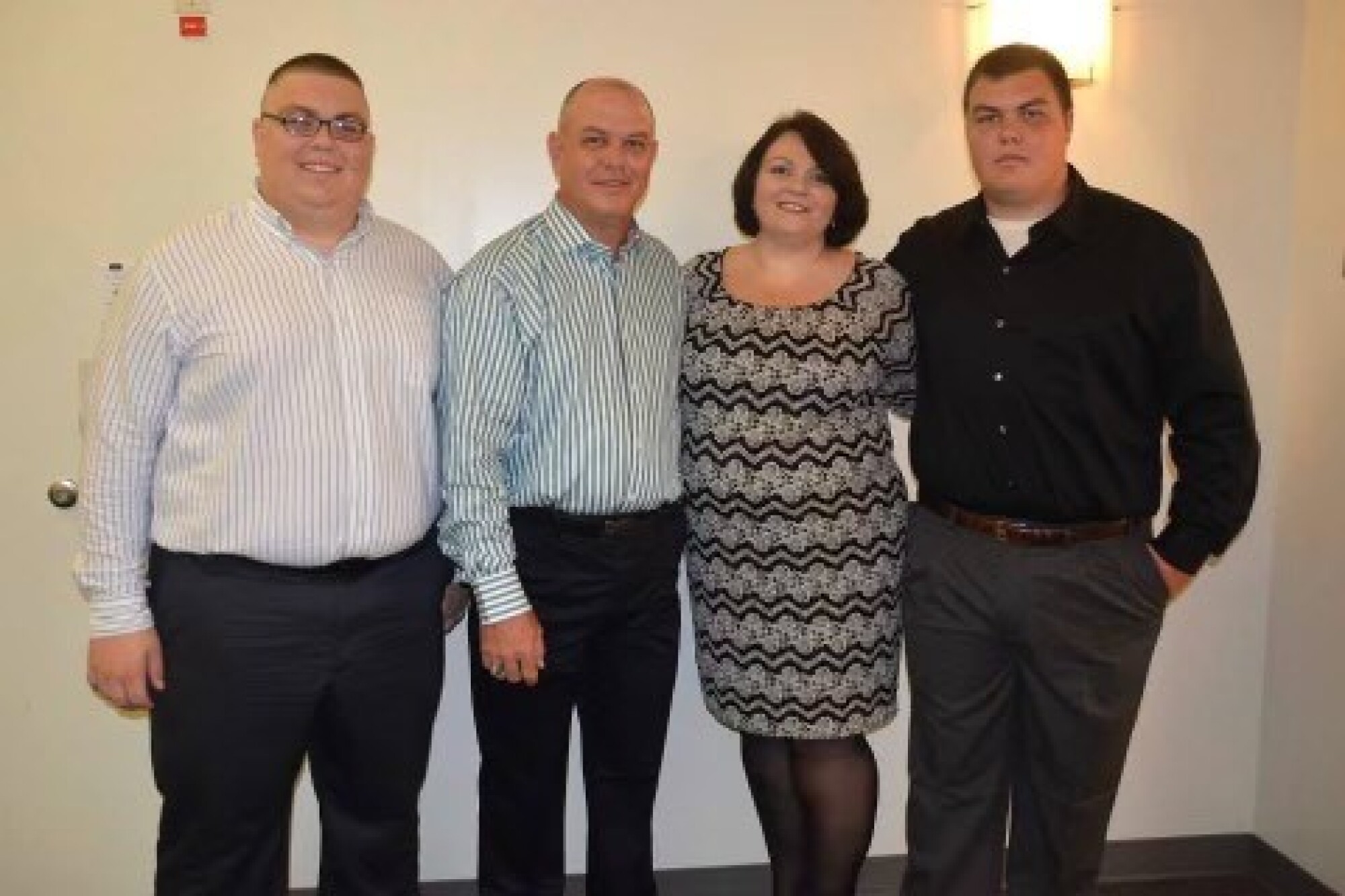 Luke Ratliff smiles in a photo with his family.