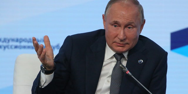 Russian President Vladimir Putin speeches during the Valdai Discussion Club's plenary meeting, on October 21, 2021, in Sochi, Russia. 