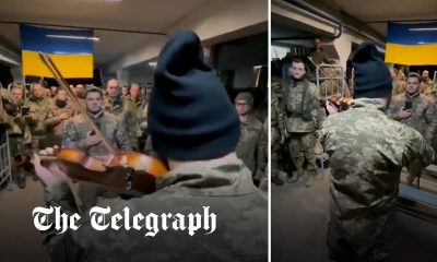 Ukrainian soldier plays national anthem on violin in symbol of hope in war against Russia