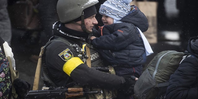 IRPIN, UKRAINE - MARCH 08: Civilians continue to flee from Irpin due to ongoing Russian attacks in Irpin, Ukraine on March 08, 2022. 