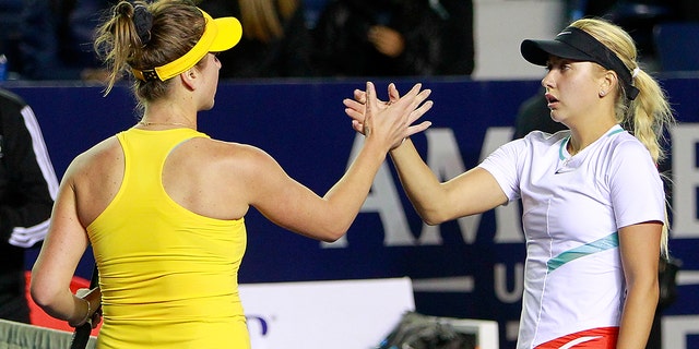 Elina Svitolina of Ukraine and Anastasia Potapova of Russia shake hands after a match between Anastasia Potapova of Russia and Elina Svitolina of Ukraine as part of Day 4 of the GNP Seguros WTA Monterrey Open 2022 at Estadio GNP Seguros on March 1, 2022, in Monterrey, Mexico. 