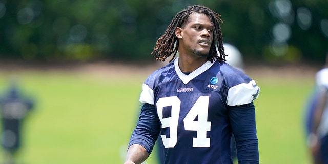 Randy Gregory (94) walks the field during an NFL football team practice, in Frisco, Texas on June 8, 2021. 