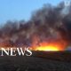 Huge smoke plumes from fire in marsh near Liverpool