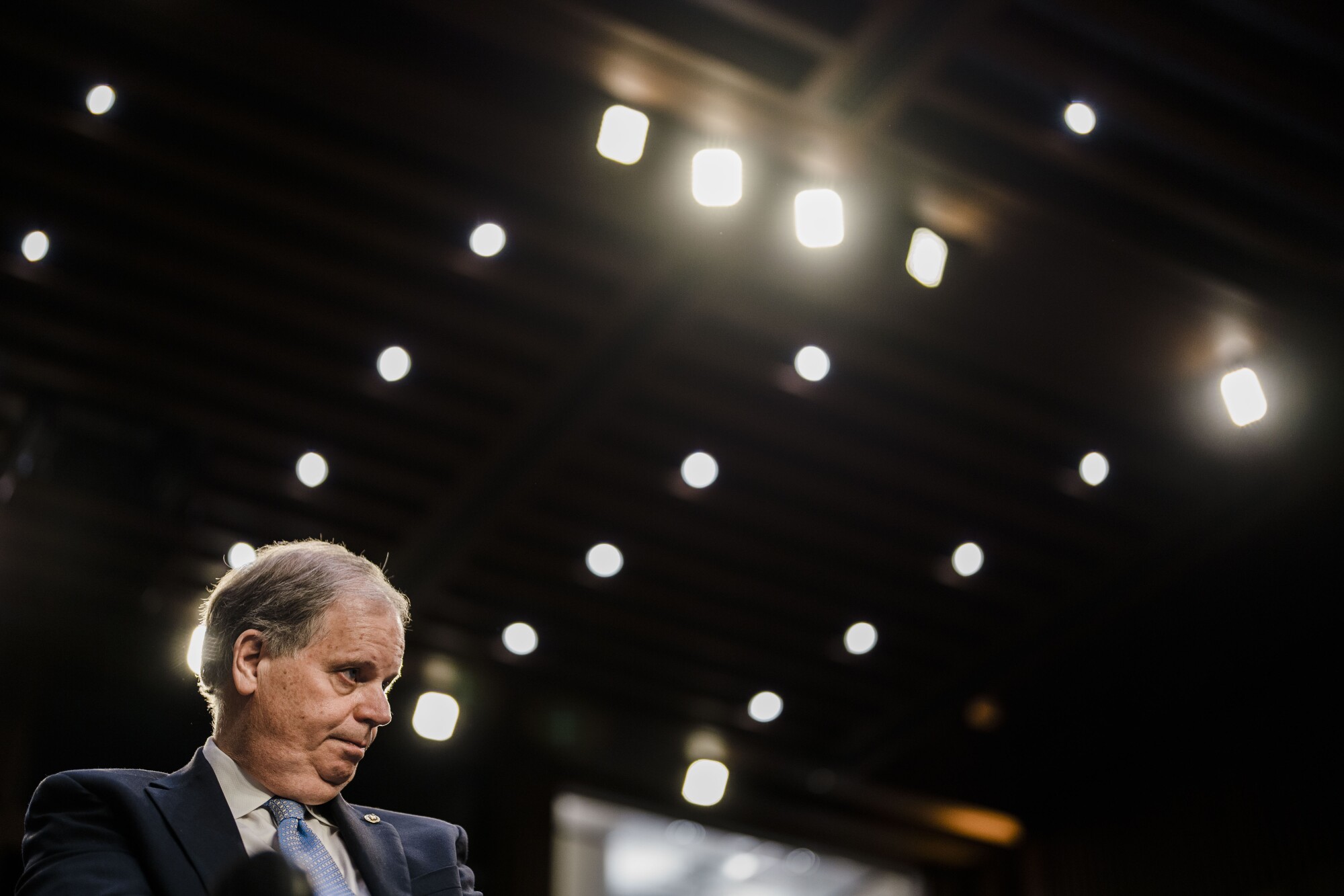 Doug Jones listens during the hearing. 