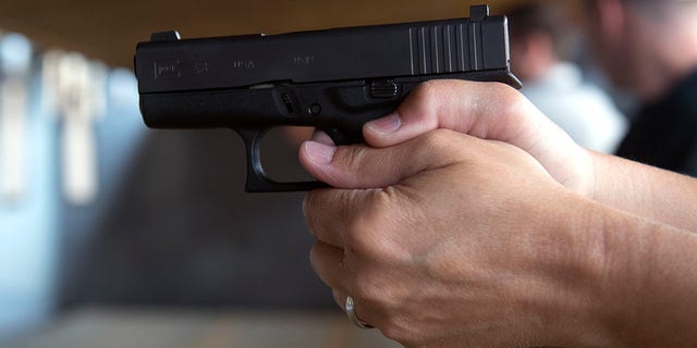 A school teacher during a firearms course at Flatrock Training Center in Commerce City, Colo, Aug. 10, 2019.