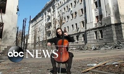 Kharkiv cellist performs in front of ruins