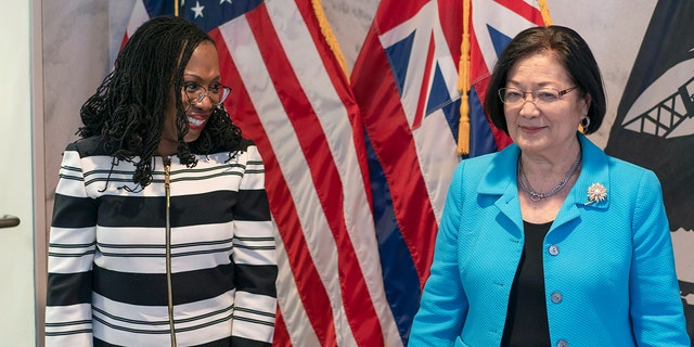 Supreme Court nominee Ketanji Brown Jackson speaks with Sen. Mazie Hirono, D-Hawaii, outside Hirono's office on Capitol Hill in Washington, Tuesday, March 8, 2022. 