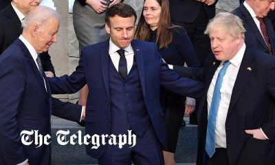 Boris Johnson, Biden and Macron link arms in display of unity at Nato summit