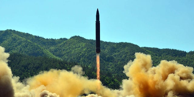 This picture taken on July 4, 2017, and released by North Korea's official Korean Central News Agency on July 5, 2017, shows the successful test-fire of the intercontinental ballistic missile Hwasong-14 at an undisclosed location. 