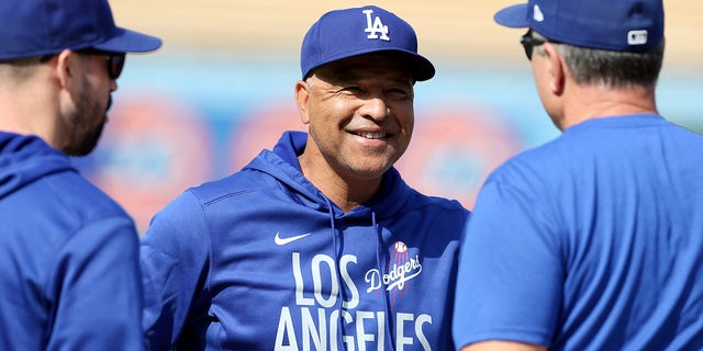 Manager Dave Roberts of the Los Angeles Dodgers looks on before the game between the St. Louis Cardinals and the Dodgers at Dodgers Stadium on Wednesday, Oct. 6, 2021, in Los Angeles, California.