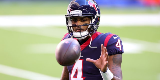 Deshaun Watson of the Houston Texans in action against the Tennessee Titans during a game at NRG Stadium on Jan. 3, 2021 in Houston, Texas.