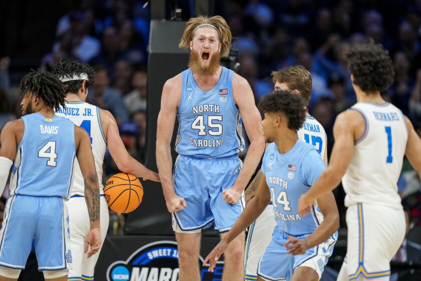 PHILADELPHIA, CA - MARCH 25: North Carolina Tar Heels forward Brady Manek (45) celebrates his basket.