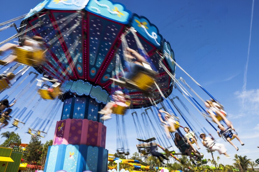 People ride Abby's Fairy Flight at Sesame Place