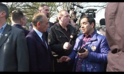 Water bottles rain down on far-right candidate Zemmour during visit to Parisian 'crack camp'