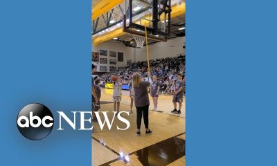 Blind basketball player makes shot