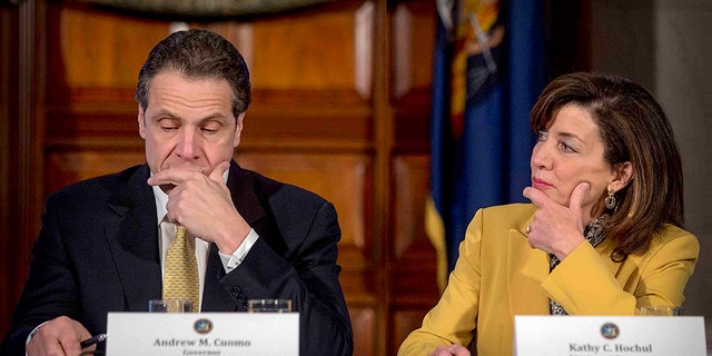 This photo from Wednesday, Feb. 25, 2015, shows New York Gov. Andrew Cuomo and Lt. Gov. Kathy Hochul during a cabinet meeting at the Capitol in Albany, New York. 