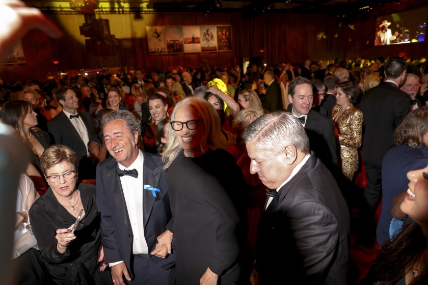Jane Campion, center, set her Oscar aside to dance at the Governors Ball. 