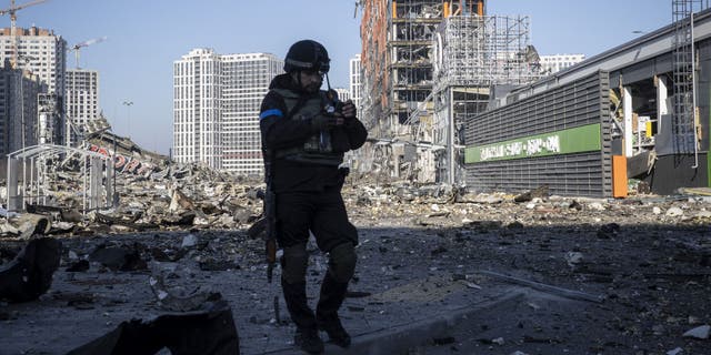 A view of destroyed buildings and vehicles after Russian attacks on a shopping mall, in Kyiv, Ukraine on March 21, 2022.