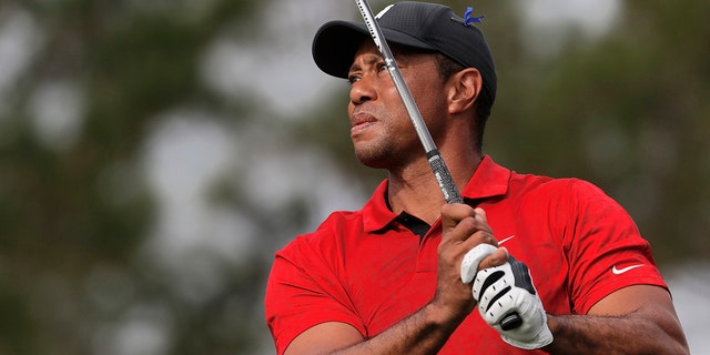 Tiger Woods tees off on the second hole during the second round of the PNC Championship golf tournament on Dec. 19, 2021, in Orlando, Florida.