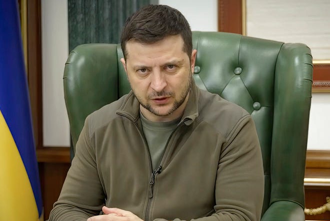 Ukrainian President Volodymyr Zelenskyy speaks in Kyiv in this image from a video provided by the Ukrainian Presidential Press Office and posted on Facebook early Saturday.