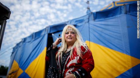 Jacque Hollander walks behind the Carson &amp; Barnes circus tent after performing. &quot;There is something very wrong here,&quot; she told CNN about the missing items in the evidence bags.