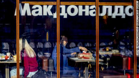 People are seen at a McDonald&#39;s restaurant in Moscow on March 9, 2022.