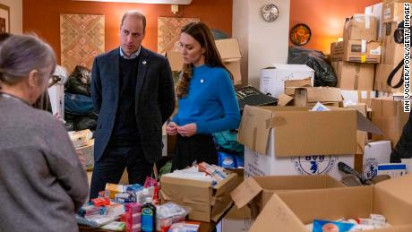 William and Catherine chat with volunteers as they pack donations to be sent to Ukraine. 