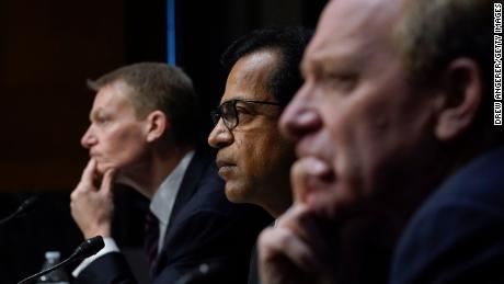 (L-R) FireEye CEO Kevin Mandia, SolarWinds CEO Sudhakar Ramakrishna and Microsoft President Brad Smith testify during a Senate Intelligence Committee hearing on Capitol Hill on February 23, 2021.