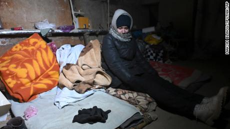 A resident is seen at the cellar of a house in Mariupol, Ukraine on March 18, 2022.