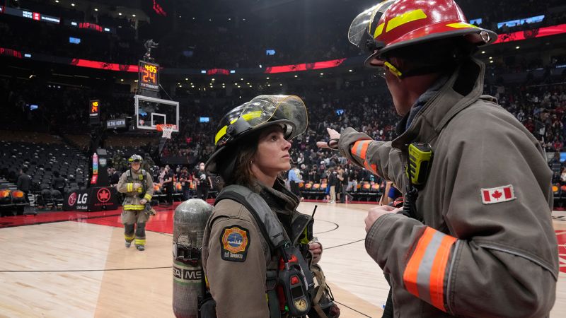 Indiana Pacers and Toronto Raptors NBA game will resume without fans after suspension due to fire | CNN