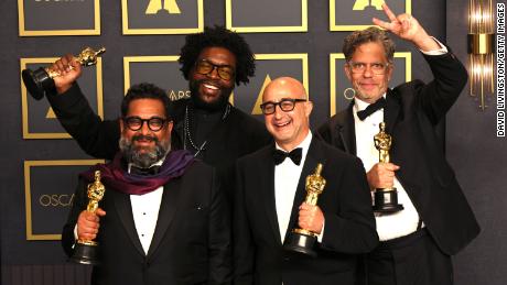 Joseph Patel, Ahmir &quot;Questlove&quot; Thompson, David Dinerstein and Robert Fyvolent, winners of Best Documentary Feature for &quot;Summer of Soul (...Or, When the Revolution Could Not Be Televised),&quot; pose in the press room during the 94th Annual Academy Awards. Look at those grins!