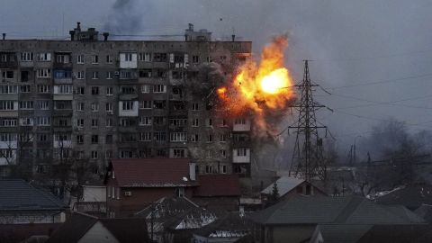 Russian forces fire at an apartment building in Mariupol, Ukraine on March 11, 2022.