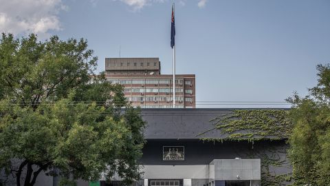 A Chinese paramilitary police officer stands guard in front of the Australian Embassy in Beijing, China, September 2020.