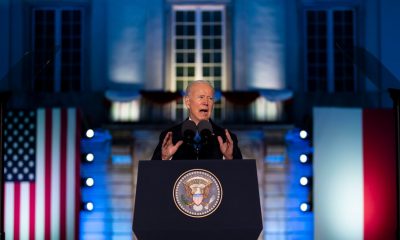 Biden denounces Russian invasion, casting it as part of a decades-long attempt to crush democracies.